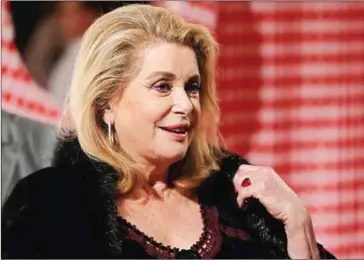  ?? VALERY HACHE/AFP ?? French actress Catherine Deneuve arrives for a Surrealist Dinner Party at the Monte Carlo Casino in Monaco on December 9.