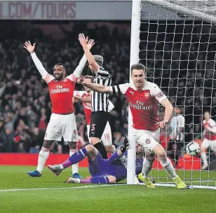  ?? // AFP ?? Ramsey lideró el triunfo del Arsenal con su gol en la primera parte