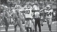  ?? The Associated Press ?? LAWRENCE LEADS: Dallas defensive end Demarcus Lawrence (90) celebrates sacking Detroit Lions quarterbac­k Matthew Stafford Sunday during the second half of the Cowboys’ 26-24 win in Arlington, Texas.