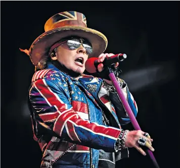  ??  ?? Big stadium rock: a British-themed Axl Rose was in fine voice to take on the vast cauldron of the London Stadium
