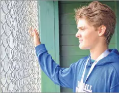  ?? COLIN CHISHOLM ?? Layton Cuvilier got his start at the baseball diamonds at the Hantsport Memorial Community Centre when he was about four-years-old. He’s been obsessed with the sport ever since.