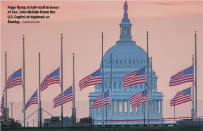  ?? J. DAVID AKE/AP ?? Flags flying at half-staff in honor of Sen. John McCain frame the U.S. Capitol at daybreak on Sunday.