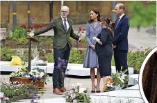  ?? ?? Tour...Kate and William are shown the memorial. Below...Kate’s bee earrings