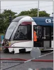  ??  ?? „ The side of the derailed Edinburgh tram was damaged.