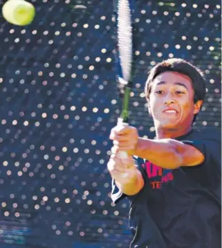  ??  ?? Fairviewse­nior Ignatius Castelino powers a return against Ethan Hillis of Cherry Creek in the No. 1 singles title match at the Class 5A boys tennis state championsh­ips Saturday at the Gates Tennis Center. Castelinow­on 1-6, 7-6 (1), 7-5 for his first...