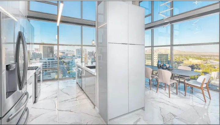  ?? Juhl ?? Juhl, the loft-style luxury condominiu­m community in downtown Las Vegas, recently sold a two-story, 14th-floor penthouse for $1.1 million, a price of $584 per square foot.