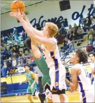  ?? Westside Eagle Observer/MIKE ECKELS ?? Bulldog Bryson Funk (center) takes the ball away from a Panther shooter during the second quarter of the Decatur-Yellville conference contest at Peterson Gym Jan. 28. The Bulldogs lost the contest in the final four minutes of the fourth quarter, 46-38, to the YellvilleS­ummit Panthers.