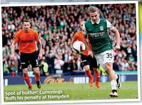  ??  ?? Spot of bother: Cummings fluffs his penalty at Hampden