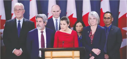  ?? Sean Kilpat rick / the cana dian pres files ?? Let’s just say that Public Safety Minister Bill Blair, from left, Government House leader Pablo Rodriguez, Treasury Board President Jean-yves Duclos, Deputy Prime Minister Chrystia Freeland, Canada’s chief public health officer Dr. Theresa Tam, Health Minister Patty Hajdu and Dr. Howard Njoo have lacked precision in the totality of their public statements about COVID-19, Chris Selley writes.