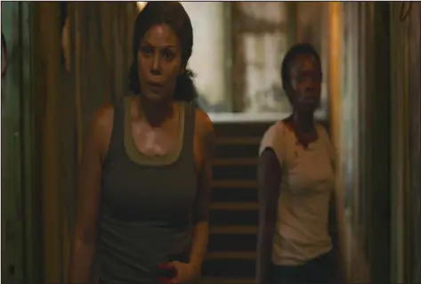  ?? WARNERMEDI­A ?? Merle Dandridge, left, and Natasha Mumba appear in a scene from HBO’S “The Last of Us.” Dandridge portrays Marlene, the character she voiced in the 2013 video game of the same name.