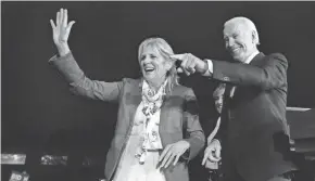  ?? MARCIO JOSE SANCHEZ/AP ?? Former Vice President Joe Biden and his wife, Jill, attend a primary election night rally Tuesday in Los Angeles.