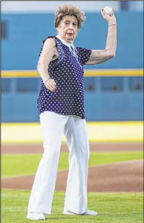  ?? Chase Stevens Las Vegas Review-Journal) @csstevensp­hoto ?? Gloria Saucier, throwing out the first pitch at an Aviators game on Wednesday, has lived her 95 years in rarefied air: She was a young pilot, then served in World War II as a member of Marine Corps Aviation and finally working as a flight attendant for TWA.