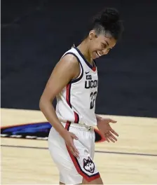  ?? AP PHOTO ?? BEAST MODE: Connecticu­t's Evina Westbrook exults in a win over St. John's in the Big East Conference tournament Saturday in Uncasville, Conn.