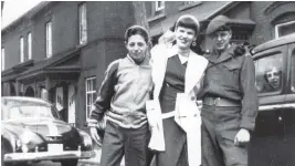  ??  ?? Frankie Cosenzo, Maggie Jubinville (Cosenzo), Albert Craig and Jeanie Cosenzo (in car) on Lett Street in LeBreton Flats in 1950.