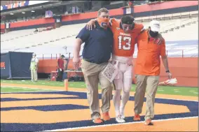  ?? DENNIS NETT - THE ASSOCIATED PRESS ?? Syracuse= quarterbac­k Tommy DeVito (13) is carried off the field in the second half against Duke during an NCAA college football game, Saturday, Oct 10, 2020, at the Carrier Dome in Syracuse, N.Y.