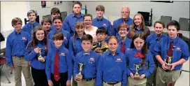  ?? (Messenger photo/Mike O’Neal) ?? Chattanoog­a Valley Middle School’s Technology Student Associatio­n members show some of the many awards their school has won in recent years.