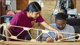  ?? ?? Teens build life-sized airplanes and radio-control models during Saturday morning sessions of the Youth Aviation Program sponsored by EAA 690.