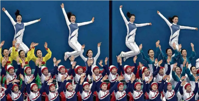  ?? Fotos Ed Jones/AFP ?? Líderes de torcida norte-coreanas se apresentam durante o jogo entre a equipe unificada feminina das Coreias de hóquei no gelo contra o Japão, nesta quarta, nos Jogos de Inverno