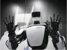 ?? Bild: Eugene Hoshiko ?? Toyotas robot T-HR3 – modellen av perfektion?