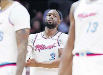  ?? WILFREDO LEE/AP ?? Dwyane Wade and his family were very happy with his trade back to Miami last week and he says here is where he’ll stay until he retires.