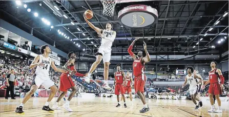  ?? FIBA ?? Quentin Grimes of the U.S. takes the ball to the hoop against Canada in the FIBA Under-18 Americas Championsh­ip in St. Catharines.