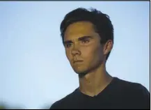  ?? SAUL MARTINEZ / THE NEW YORK TIMES ?? A video falsely claims that David Hogg, 17, a survivor of the Marjory Stoneman Douglas High School mass shooting, was in reality a “crisis actor.” Before YouTube pulled it for violating the company’s policy on harassment and bullying, the video briefly...