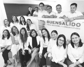  ??  ?? Joy Lumawig Buensalido (fourth from left), president and Ceo of her namesake agency, with the rest of her team.