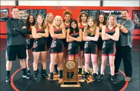  ?? STACI VANDAGRIFF/THREE RIVERS EDITION ?? The Searcy High School girls wrestling team won the program’s first state championsh­ip Feb. 20 at the Arkansas High School wrestling championsh­ips at the University of Arkansas at Little Rock’s Jack Stephens Center. In the front row, from left, are assistant coach Quint Ashburn, Lily Davis, Maty Lincoln, Roselyn Amaya, Chloe Belford and Christian Waldrup. In the back row are Bryce Smith, MyKenzie Clark, Trinity Danberry, Harley Seymore, Vivi Edwards and head coach Jerry Evans.