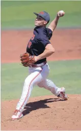  ??  ?? Sophomore right-hander Cody Dye supplied the Lobos with a lengthy outing just when it was most needed, and he threw seven innings and struck out eight Air Force batters.