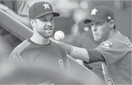  ?? Karen Warren / Houston Chronicle ?? Astros pitcher Collin McHugh will play catch every other day for the first week of his process of returning from elbow impingemen­t but said his progress will depend on how his arm and body respond.