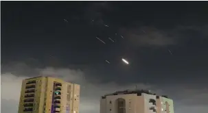  ?? (Tomer Neuberg/Flash90) ?? ANTI-MISSILE intercepto­rs en route to meeting incoming drones and missiles fired from Iran, as seen over Tel Aviv yesterday.