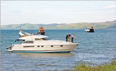  ?? Photograph: Don Dennis. ?? The Trafalgar became stuck on a sandbank in Ardminish Bay.