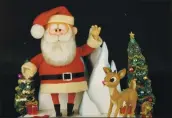  ?? PROFILES IN HISTORY VIA AP ?? Santa Claus and Rudolph figures used in the “Rudolph the Red-Nosed Reindeer” special are being sold together.