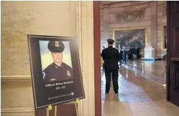  ?? BRENDAN SMIALOWSKI/GETTY-AFP ?? The D.C. medical examiner’s office ruled police Officer Brian Sicknick, seen in a photo at the Capitol, suffered a stroke and died from natural causes.