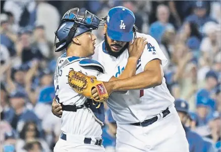  ?? Wally Skalij Los Angeles Times ?? DODGERS CLOSER Kenley Jansen, right, with catcher Austin Barnes, has a save and a victory in the first two games of the NLCS.