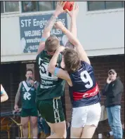  ??  ?? Beau Hornidge takes a great contested mark.