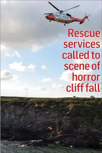  ?? Coast Guard helicopter EI-1CA lifting an injured man from the cliffs at Bín Bán, Dingle, on Monday evening. Photo by Declan Malone ??