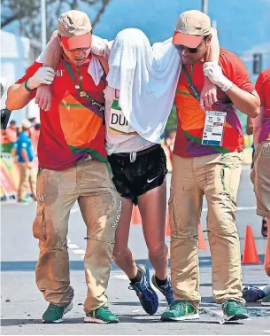  ?? JEWEL SAMAD/GETTY IMAGES FILE PHOTO ?? Canadian race walker Evan Dunfee needed assistance in Rio’s high temperatur­es after he placed fourth in his event at the 2016 Olympics. For the 2020 Olympics, there will be tech assistance.