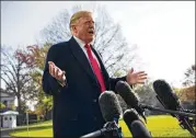  ?? DOUG MILLS / NEW YORK TIMES ?? President Donald Trump speaks to reporters about his former lawyer, Michael Cohen, before departing the White House on Thursday.