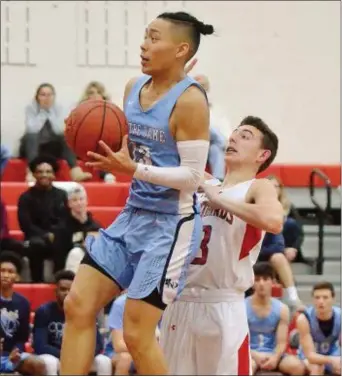  ?? KYLE FRANKO — TRENTONIAN FILE PHOTO ?? Notre Dame’s Justin Yu, left, had 26 points in the win over Mater Dei on Saturday.