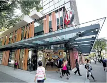  ?? THE CANADIAN PRESS FILES ?? Shoppers enter Lululemon Athletica’s flagship store in Vancouver, B.C. The retailer’s fourth-quarter earnings missed analyst expectatio­ns.