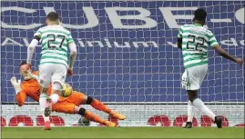  ??  ?? Odsonne Edouard’s penalty is saved by Allan McGregor
