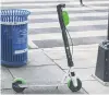  ?? PHOTO: AP ?? A Lime scooter on a footpath.
