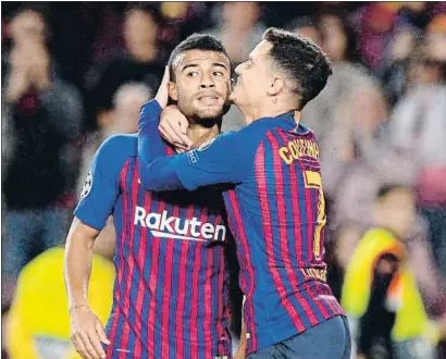  ?? JOSEP LAGO / AFP ?? Rafinha y Coutinho se abrazan para celebrar el primer gol azulgrana, anoche en el Camp Nou