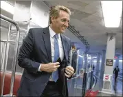  ?? J. SCOTT APPLEWHITE / ASSOCIATED PRESS ?? Sen. Jeff Flake, R-Ariz., in Washington earlier this month, told a New Hampshire audience Friday that he hopes a Republican will step forward to challenge President Donald Trump in 2020.