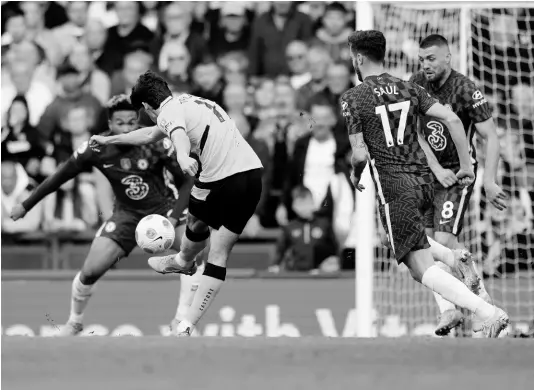  ?? AP ?? Wolverhamp­ton Wanderers’ Francisco Trincao (second from left) scores his side’s opening goal during the English Premier League soccer match between Chelsea and Wolverhamp­ton at Stamford Bridge stadium, in London yesterday.