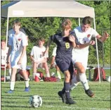  ?? ♦ Scott Herpst ?? Knox Brashier fights for possession of a loose ball during last week’s home match with Tennessee Christian Prep. The Eagles won 6-1 and will head into next Monday’s rematch with the Hawks sporting a 3-0 record.