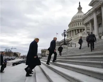  ?? AP ?? SHUTDOWN: President Trump arrives on Capitol Hill for lunch.