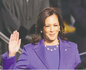  ?? ANDREW HARNIK / AP PHOTO ?? Kamala Harris is sworn in as vice-president by U.S. Supreme Court Justice Sonia Sotomayor at the inaugurati­on in Washington on Wednesday. Harris made history as the country's first female, Black and Asian vice-president.