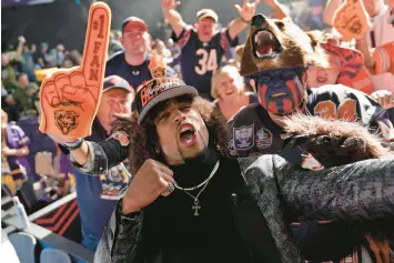  ?? JAE C. HONG /AP ?? Washington cornerback Kyler Gordon celebrates with fans after being selected by the Chicago Bears during the second round of the NFL draft on Friday.